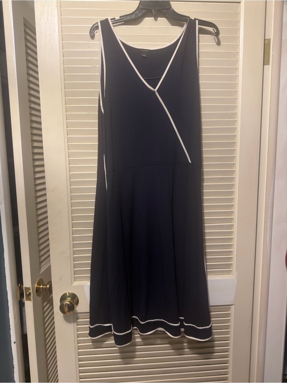 Sleeveless Black Dress with White Trim - Classic A-Line
